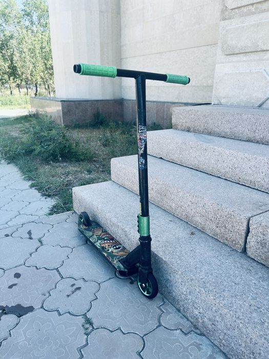 Самокат зелёный чисто