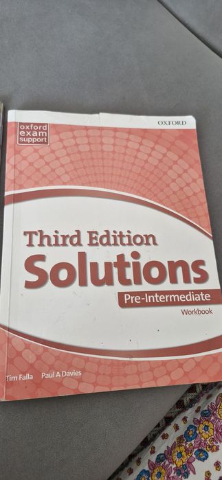 Продам учебник Solutions