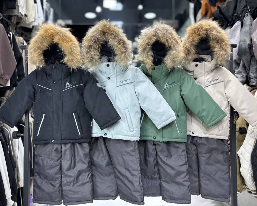 Продам новые  зимние комбинезоны.