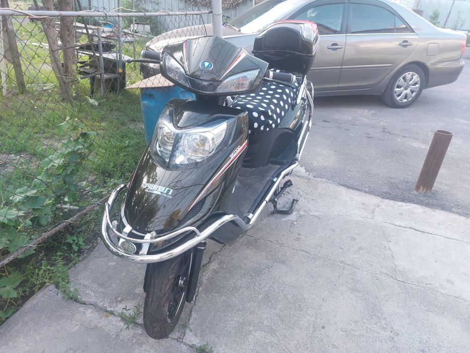 Электроскутер мопед