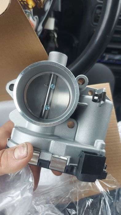 Продам дроссельную заслонку