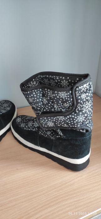 Продам новые сапоги- дутики