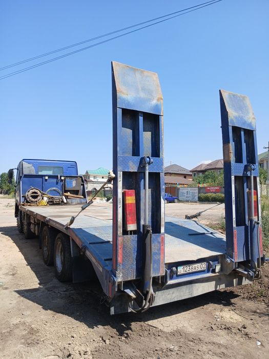 Грузовой эвакуатор или трал