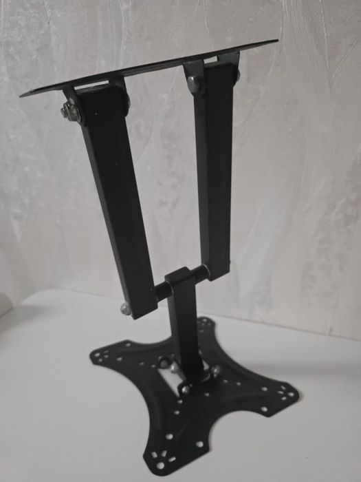 Продам кронштейн