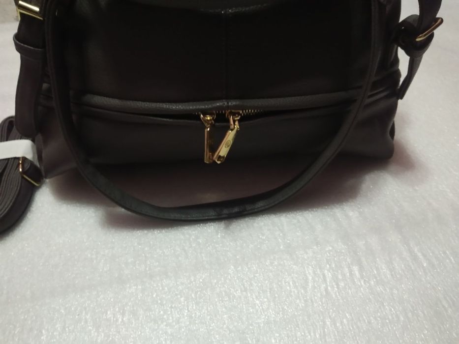 Новая сумка очень красивая большая чистая кожа