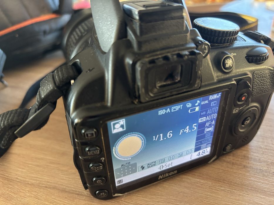 Vand aparat foto Nikon D3100 cu obiectiv VR 18/55