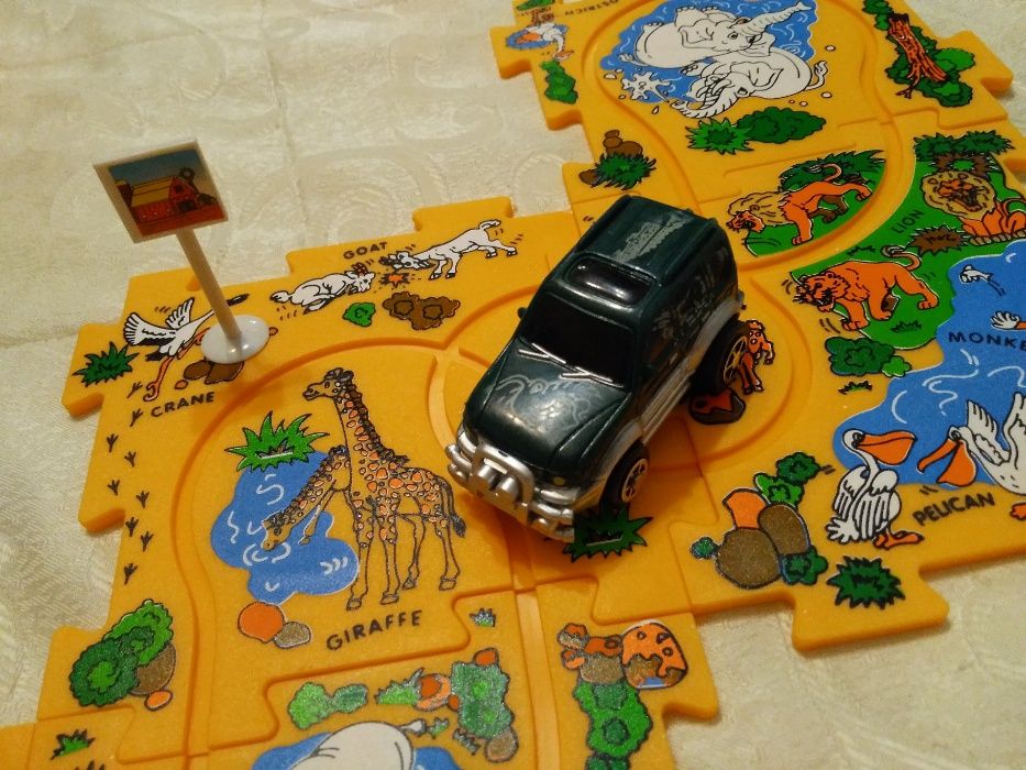 Joc educativ-puzzle, SAFARI PRIN JUNGLA, masinuta pe baterii