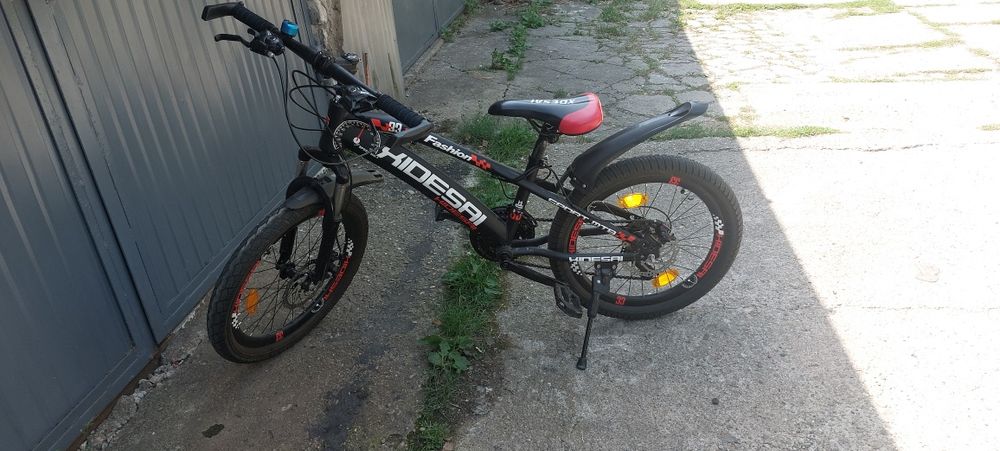 Vând bicicleta copii 9-12 ani