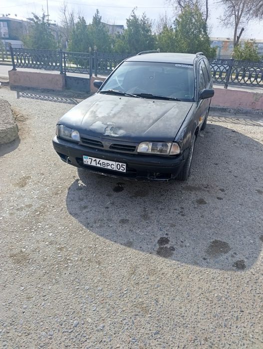 Ниссан примера 2.0