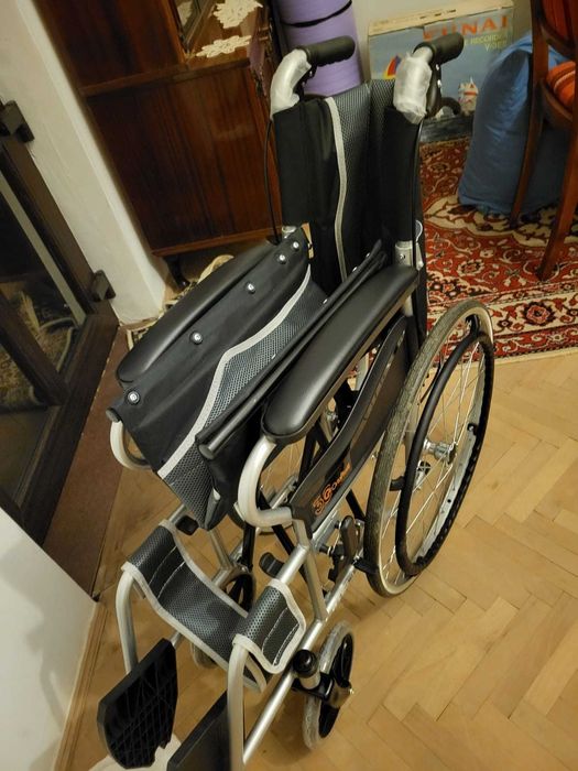 urgent scaun cu rotile cu actionare manuala nou