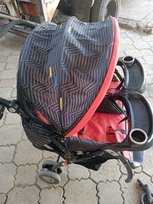 Коляска для двойни, погодок