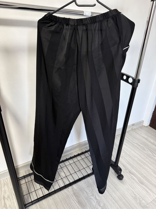 Pantaloni Femei.