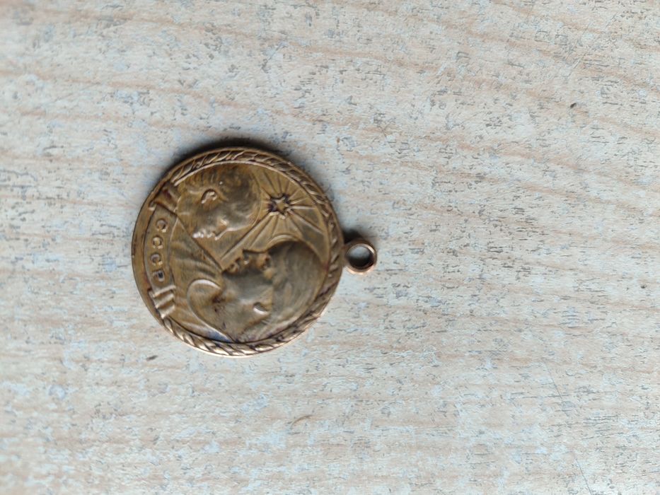 Медаль материнства