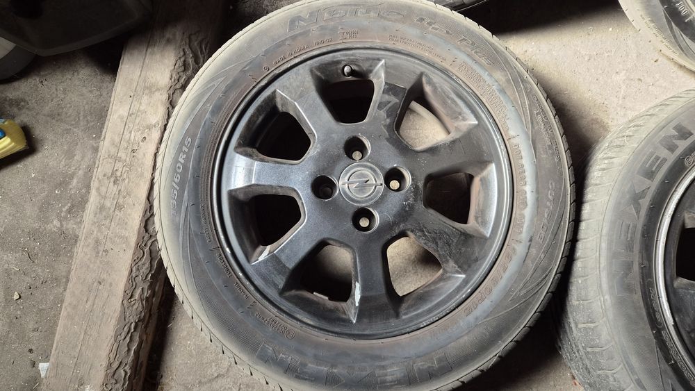 Оригинални джанти Opel 4x100 / 6Jx15 ET49 с гуми Nexen 195/60 R15