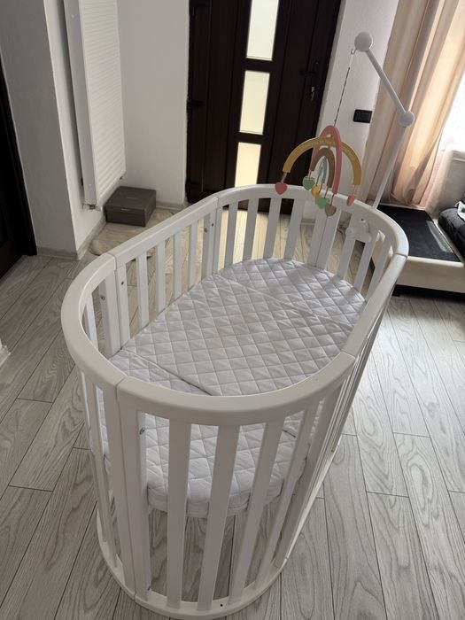 Vând pătuț bebe Marvis – oval/rotund, transformabil 9 în 1 – ALB