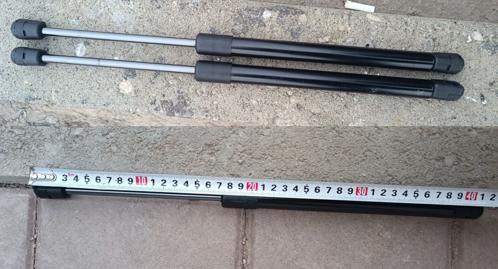 Газовые упоры для пятой двери багажника авто