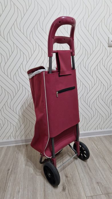 Продам сумку на колесиках новая