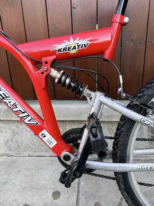 Bicicletă copii MTB Kreativ Dinamik 24", 18 viteze, dublă suspensie – stare bună