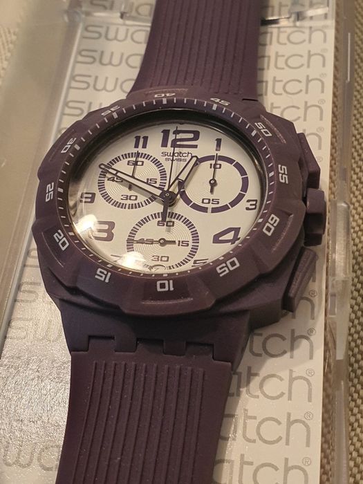 Swatch NOU 43 mm unisex ( mov- lila )