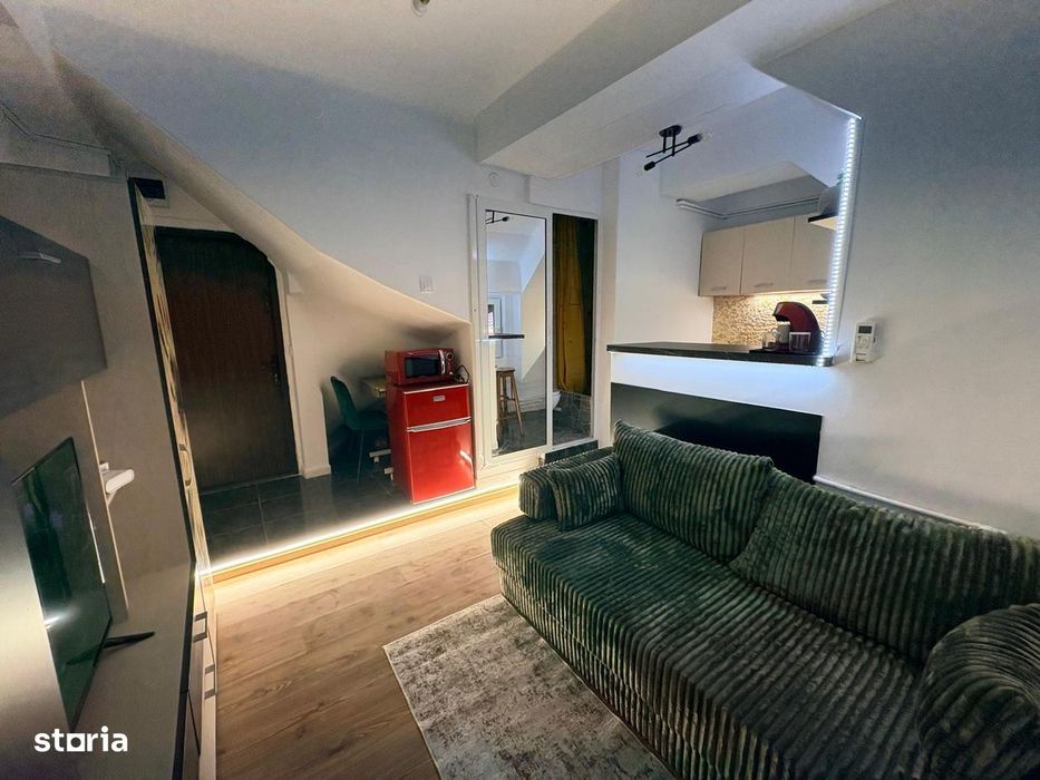 Garsoniera renovata-Piata Lahovari/Romana/ASE-curte privata,acces auto