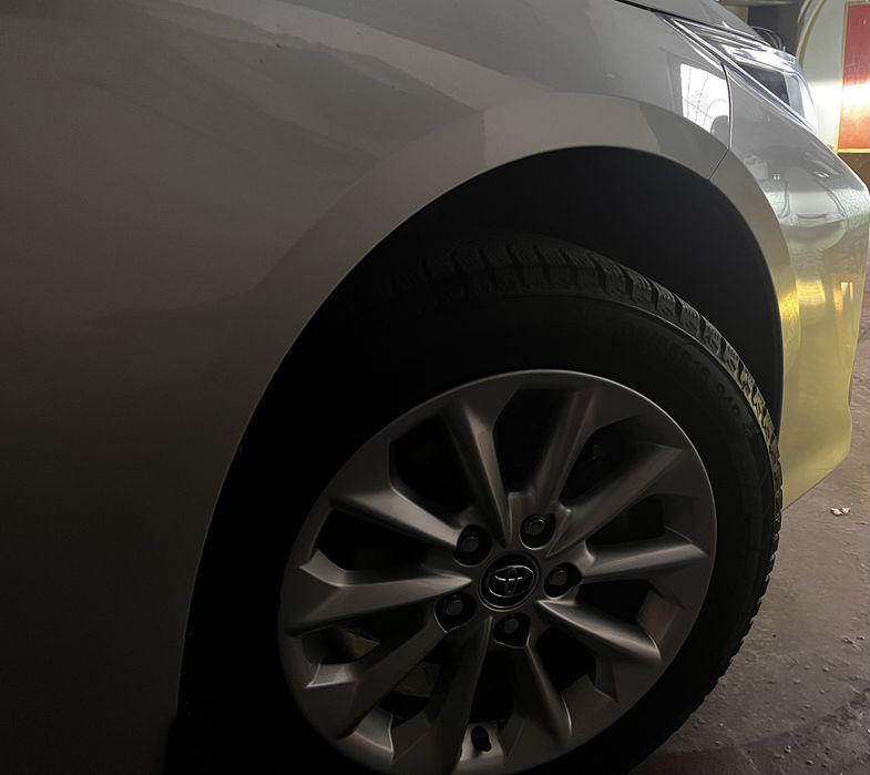 Tayota Corolla E210