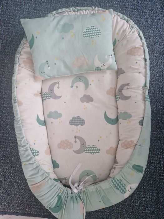 Бебешко гнездо с възглавница и игрсчки