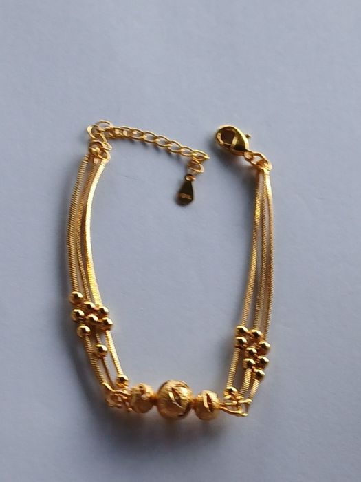 Brățară de dama ,plăcută cu aur 18k