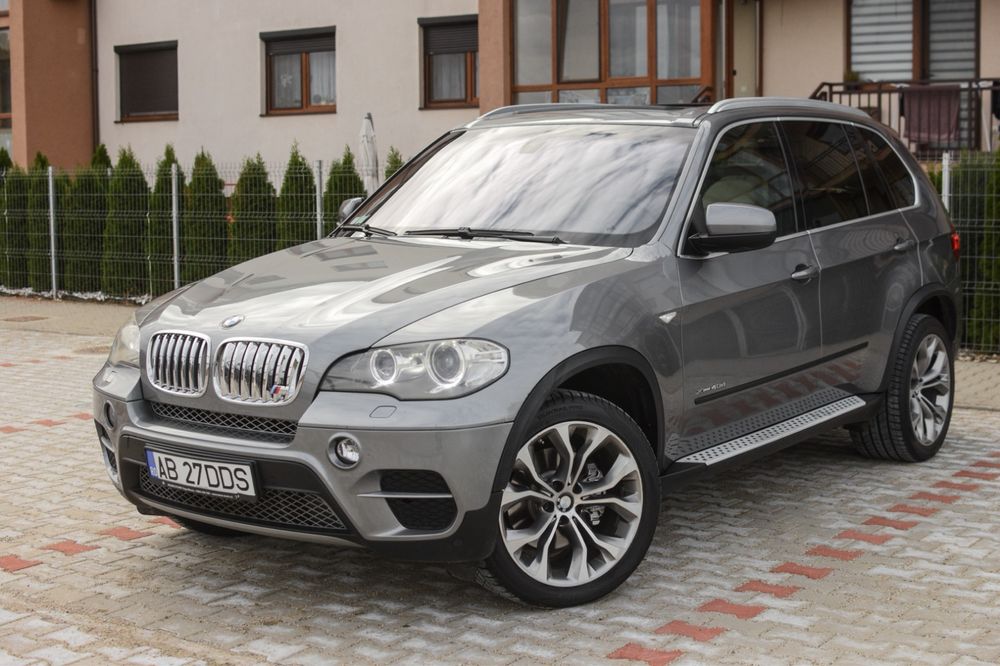 BMW X5 2010 — imagine 1