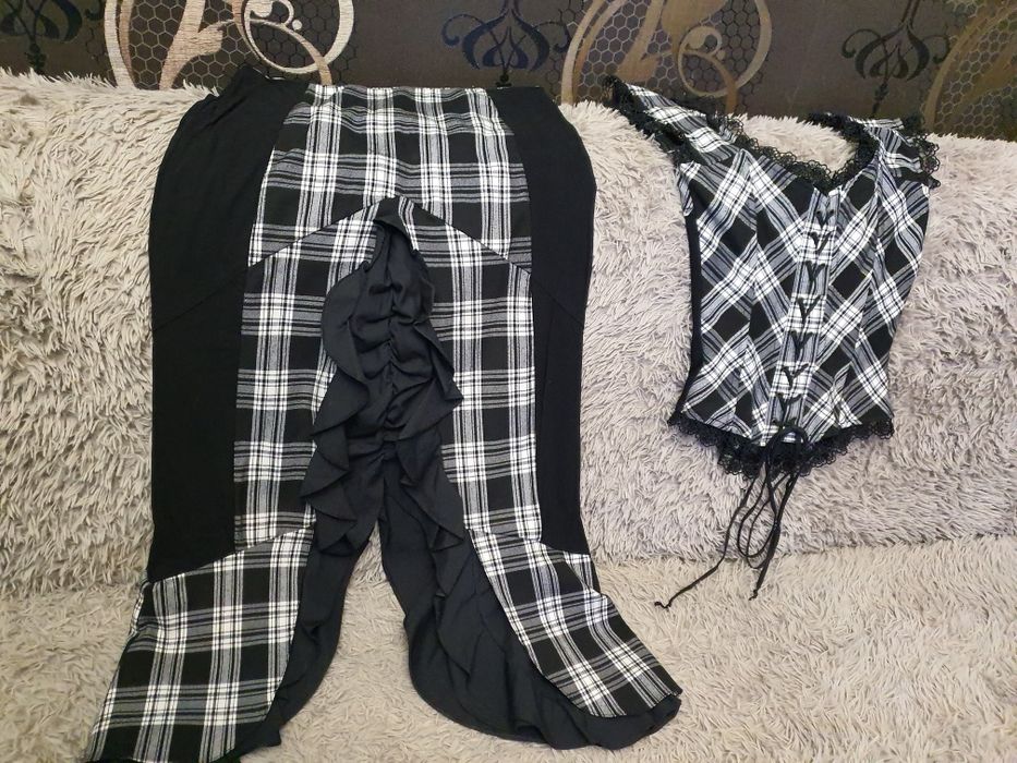 Два костюма  Турция, новый и б/у размер 40