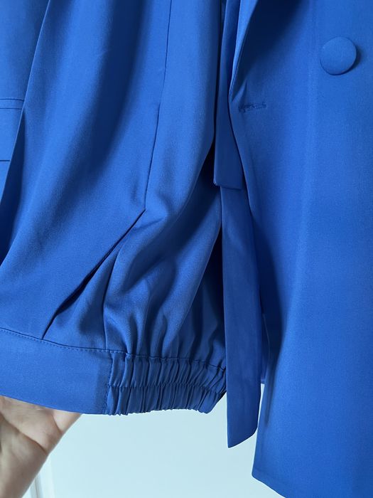 Продам брючный синий костюм