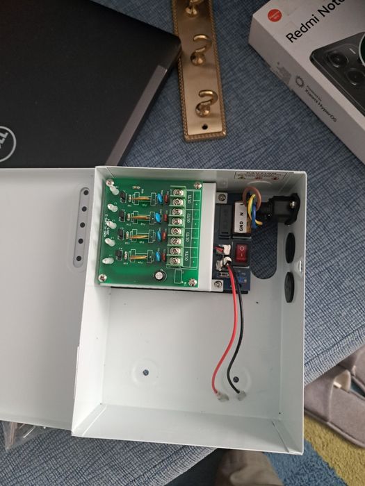 Sursa de alimentare CCTV cu back-up, 12V 5A, 4 iesiri, KAS-DC120405B