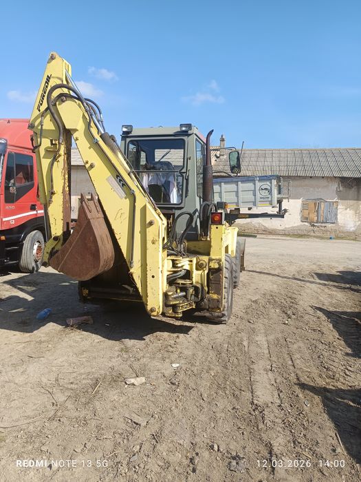 Buldoexcavator.inarcator frontal