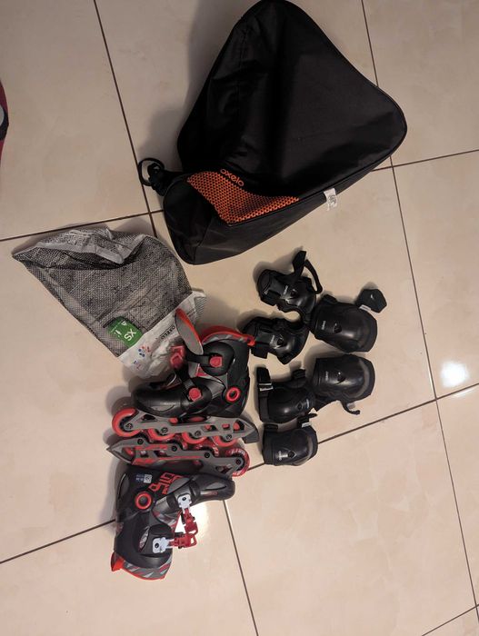 Role oxelo  reglabile 32-34 ca noi ,set protective si geanta noua