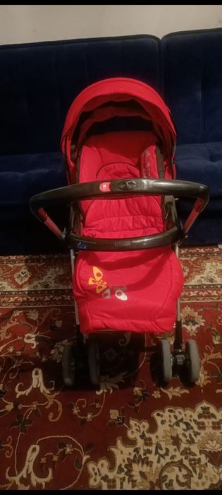 Коляска детская красная