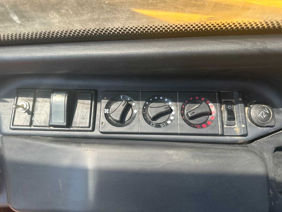 Телескопичен товарач Caterpillar TH337C