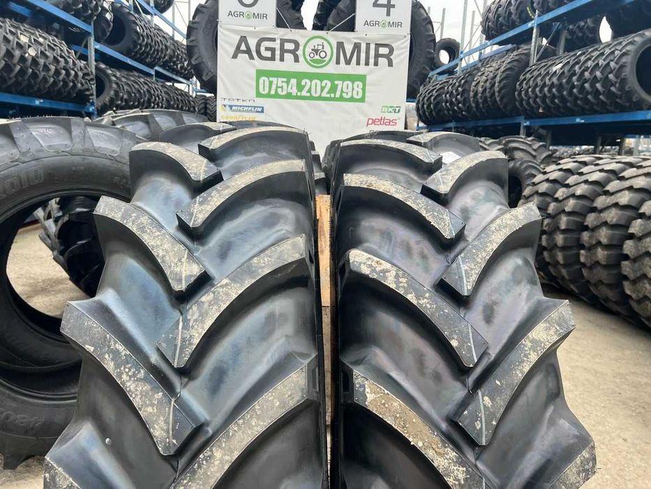 Anvelope noi 16.9-34 marca OZKA cu 10 pliuri pentru tractor spate CASE