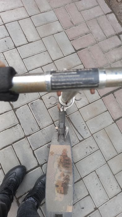 Самокат б/у, в хорошем состоянии