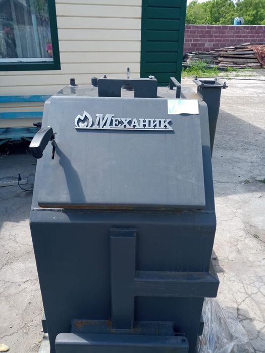 Котёл длительного горения Механик