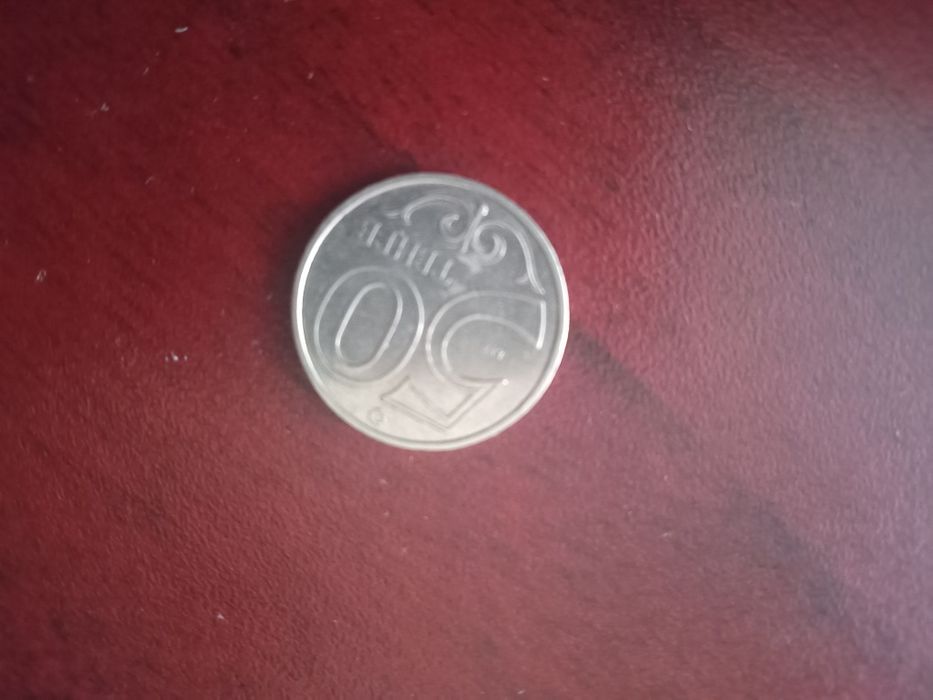 Продам монету 50 тг