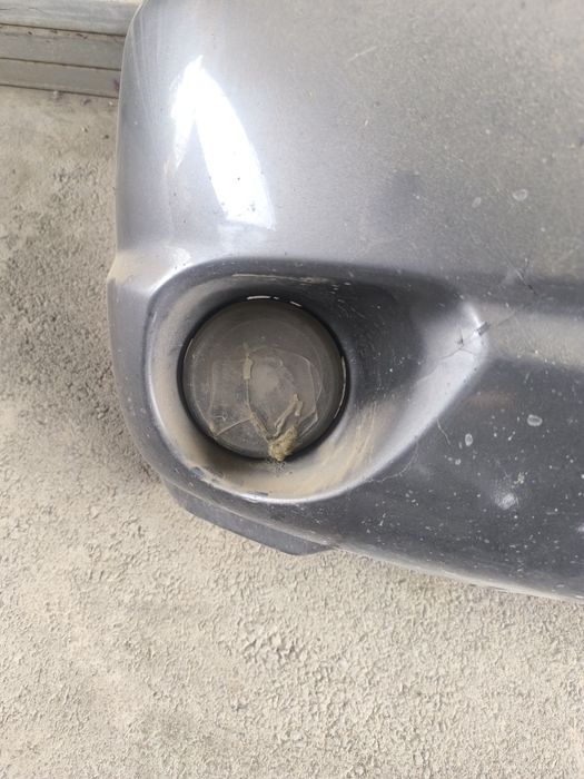 Передний бампер Мазда трибют