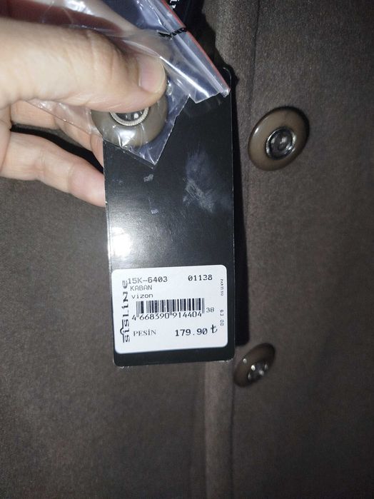 Пальто совершенно новое