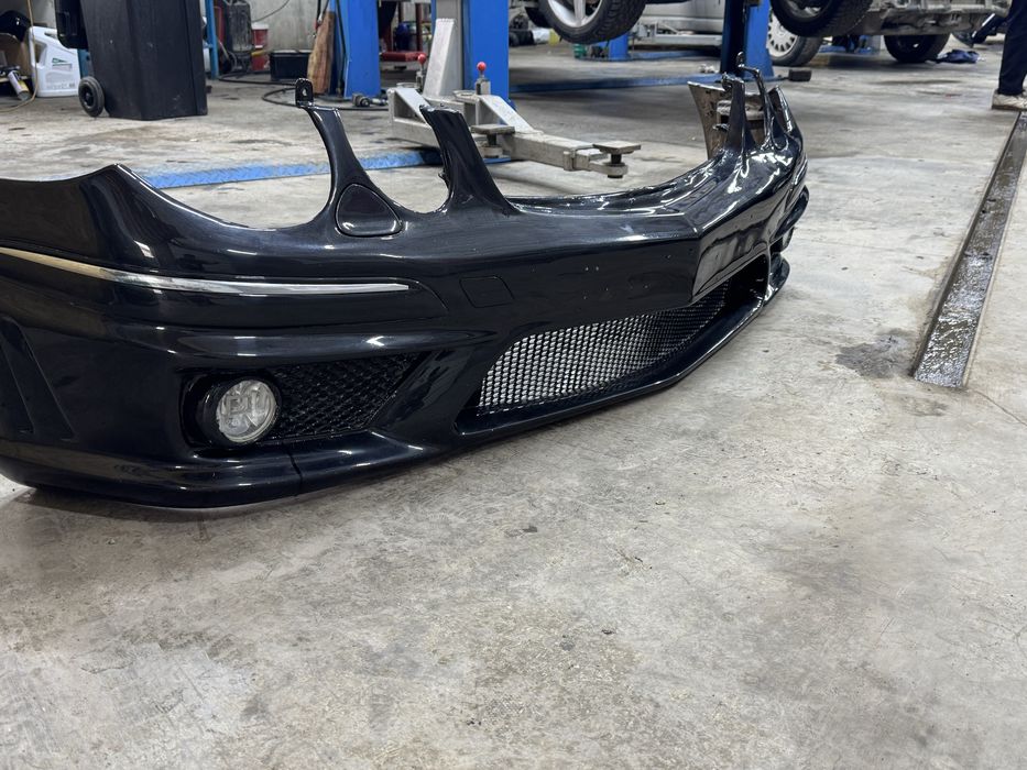 Передный бампер W211