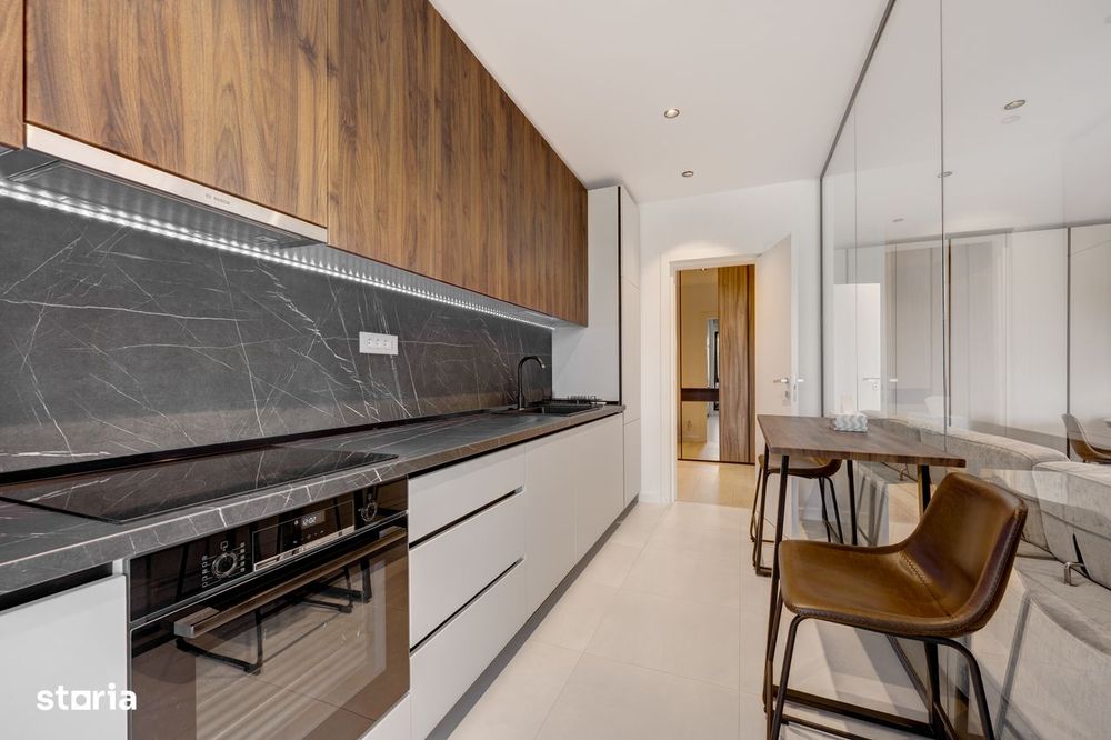 Închiriere: 2 Camere cu Design Interior în Nusco City | Loc de Parcare