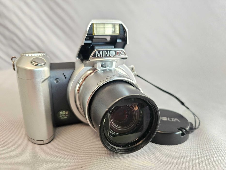 Vand MINOLTA DImage 10X, bridge. Ca nou!