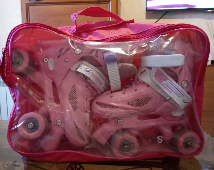 Роликовые коньки