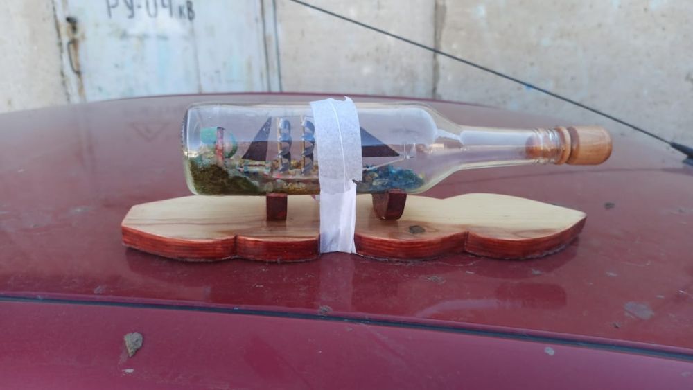 Корабль в стеклянной бутылки