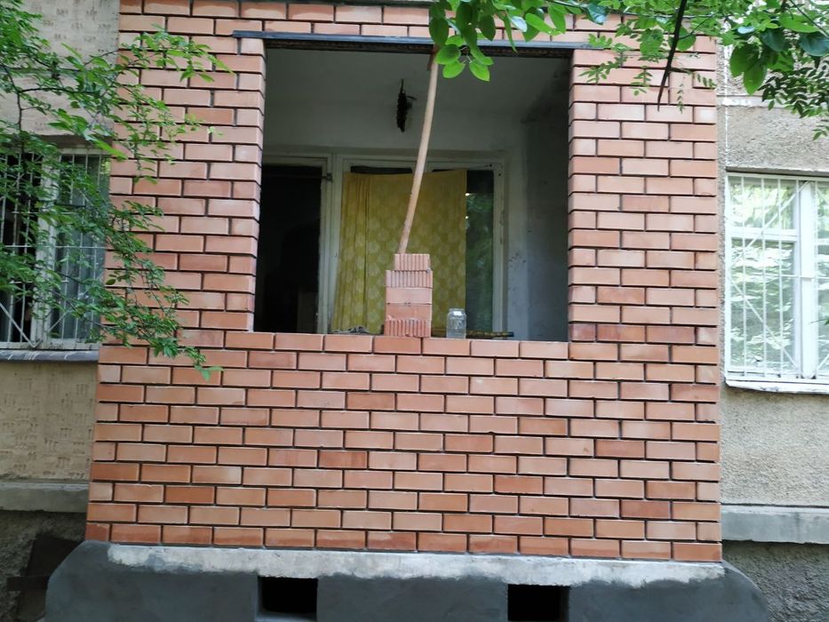 Утепление болкон.Кладка кирпича