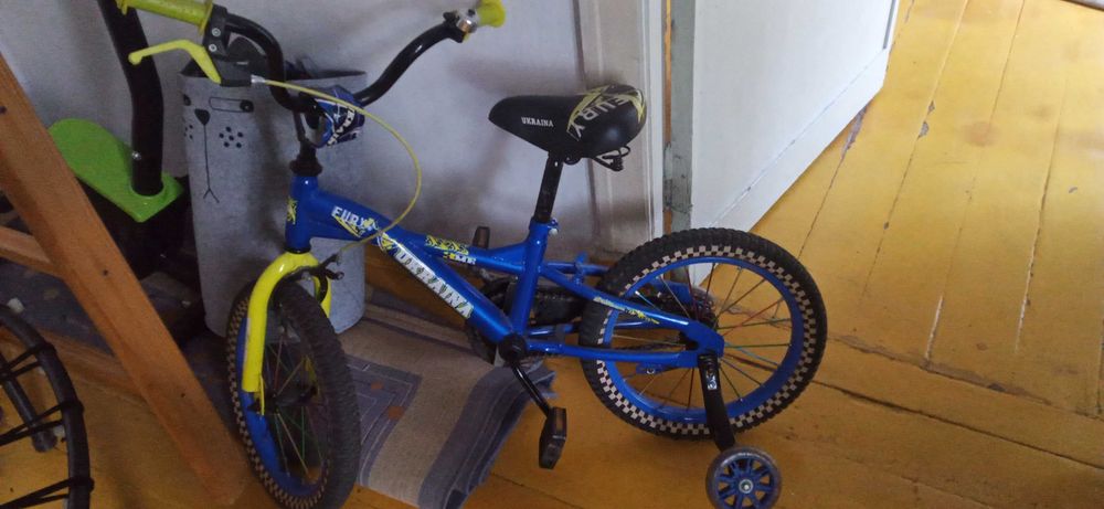 Велосипед с подстраховкой колес