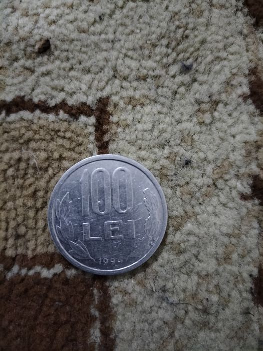 Vând moneda 100 lei an 1994