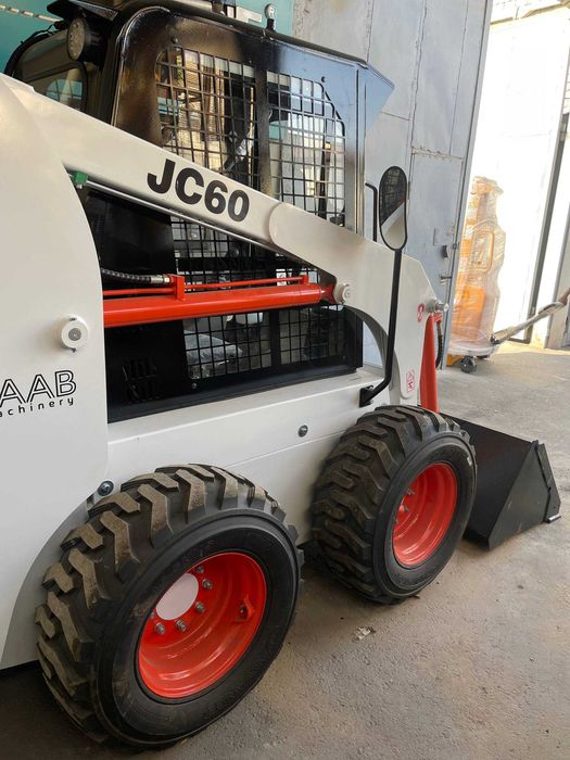 Погрузчик с бортовым поворотом Мини погрузчик  BOBCAT